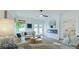 Comfortable living room boasts modern fireplace, ample seating, and doors to the patio at 1846 Butterfly Way, Marietta, GA 30066