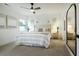 Elegant main bedroom with decorative trim and neutral decor and ceiling fan at 1846 Butterfly Way, Marietta, GA 30066