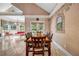 Lovely dining area with tile flooring, lots of natural light, and french door access to the backyard at 3018 Saint Andrews Ct, Jonesboro, GA 30236