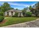 Stunning single-story home with a lush green lawn and mature landscaping at 3018 Saint Andrews Ct, Jonesboro, GA 30236