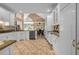 Bright kitchen with white cabinets, stainless steel appliances, and an open layout at 3018 Saint Andrews Ct, Jonesboro, GA 30236