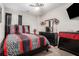 Modern bedroom featuring stylish zebra pattern decor and plenty of storage at 7244 Rockhouse Rd, Austell, GA 30168