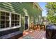 Backyard view with deck and green exterior at 1027 Spring Mill Sw Dr, Lilburn, GA 30047
