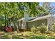 View of the backyard from the home's exterior at 1027 Spring Mill Sw Dr, Lilburn, GA 30047