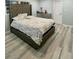 Tastefully decorated bedroom with a stylish headboard and plenty of natural light at 1838 Cates Ct, Snellville, GA 30078