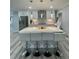 Stylish kitchen with a large island, pendant lighting, and stainless steel appliances at 1838 Cates Ct, Snellville, GA 30078