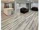 Open concept living area featuring modern flooring and comfortable seating at 1838 Cates Ct, Snellville, GA 30078
