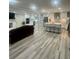 Open concept living area featuring a modern kitchen with a large island at 1838 Cates Ct, Snellville, GA 30078