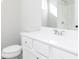 Bathroom featuring a white vanity with sink and shaker cabinets and a soaking tub at 2729 Creek View Nw Ter, Atlanta, GA 30318