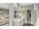 Elegant bathroom showcasing double vanities, marble countertops, and walk-in closets at 2729 Creek View Nw Ter, Atlanta, GA 30318