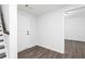 Bright entryway featuring wood-look flooring, white door, and access to another room at 2729 Creek View Nw Ter, Atlanta, GA 30318