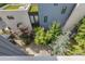 Overhead view of the modern home and meticulously landscaped backyard with trees, gravel, and bluestone at 53 Daniel Se St, Atlanta, GA 30312
