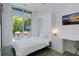 Small bedroom featuring Murphy bed, desk, and outdoor living access at 53 Daniel Se St, Atlanta, GA 30312