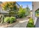 Well designed courtyard area featuring gravel, lush trees, seating and a walkway to the patio at 53 Daniel Se St, Atlanta, GA 30312