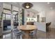 Modern dining area with access to the outdoor patio, and modern kitchen at 53 Daniel Se St, Atlanta, GA 30312