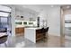 Open kitchen floor plan features seating and stainless appliances with easy access to outdoor living at 53 Daniel Se St, Atlanta, GA 30312