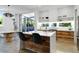 Spacious kitchen featuring bar seating, stainless appliances and access to outdoor living at 53 Daniel Se St, Atlanta, GA 30312