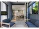 Covered patio leads to open floor plan living area with staircase at 53 Daniel Se St, Atlanta, GA 30312