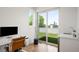 Bright office space with modern desk, outdoor access and city views, creating an inspiring work environment at 53 Daniel Se St, Atlanta, GA 30312