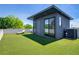 This roof deck offers artificial turf, seating and easy access to the interior of the modern building at 53 Daniel Se St, Atlanta, GA 30312