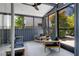 Modern sunroom featuring lots of windows and comfortable seating at 53 Daniel Se St, Atlanta, GA 30312