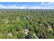 Aerial view showcases the wooded neighborhood at 5816 Chamblee Dunwoody Rd, Atlanta, GA 30338