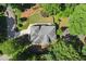 An aerial view of the home displaying the roof and surrounding landscape at 5816 Chamblee Dunwoody Rd, Atlanta, GA 30338