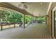 Expansive covered deck ideal for outdoor entertaining and relaxing at 5816 Chamblee Dunwoody Rd, Atlanta, GA 30338