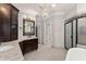 Lavish bathroom showcasing double sinks, granite countertops, and a standalone shower at 5816 Chamblee Dunwoody Rd, Atlanta, GA 30338
