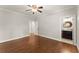 Bedroom with hardwood floors, recessed lighting, and connecting bathroom at 5816 Chamblee Dunwoody Rd, Atlanta, GA 30338