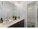 Clean bathroom with a double vanity, neutral color scheme, and modern fixtures at 1338 Dupont Nw Park, Atlanta, GA 30318
