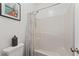 Functional bathroom with a shower-tub combo and neutral colored finishes at 1338 Dupont Nw Park, Atlanta, GA 30318