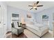 Cozy bedroom with soft hues, ceiling fan, large windows, and comfortable seating at 1338 Dupont Nw Park, Atlanta, GA 30318