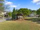 Community green space featuring picnic area and mature landscaping at 1338 Dupont Nw Park, Atlanta, GA 30318