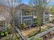 Attractive two-story home with well-maintained landscaping and a white picket fence at 1338 Dupont Nw Park, Atlanta, GA 30318