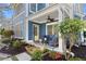 Inviting front porch with comfortable seating area and attractive landscaping at 1338 Dupont Nw Park, Atlanta, GA 30318