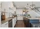 A gourmet kitchen with stainless steel appliances, custom cabinetry, and granite countertops at 1338 Dupont Nw Park, Atlanta, GA 30318
