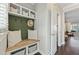 Charming mudroom features built-in bench, storage, and stylish accents for organized entry at 1338 Dupont Nw Park, Atlanta, GA 30318