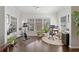 Sunlit office area with an exercise bike, desk, and an abundance of natural light at 1338 Dupont Nw Park, Atlanta, GA 30318