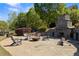 Inviting stone patio with a fireplace and seating area, perfect for outdoor entertaining and relaxation at 1338 Dupont Nw Park, Atlanta, GA 30318