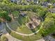 Aerial view of a community playground with play structures and green space at 1338 Dupont Nw Park, Atlanta, GA 30318