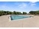 Community pool on a clear, sunny day with lush trees in the background at 1338 Dupont Nw Park, Atlanta, GA 30318