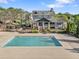 Community pool with a large deck and clubhouse in a residential area at 1338 Dupont Nw Park, Atlanta, GA 30318