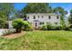 Charming two-story home with landscaped front yard and beautiful lawn at 2580 Hyde Manor Dr, Atlanta, GA 30327