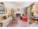 Bright living room with fireplace, decorative art, and ample seating space at 2580 Hyde Manor Dr, Atlanta, GA 30327