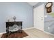 Inviting entryway features stylish wood floors, a decorative table, and a classic regulator clock adding charm at 39 Cannon Pl, Dallas, GA 30157