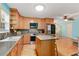 Well-equipped kitchen featuring updated appliances, ample cabinet space, and a convenient island for meal prep at 39 Cannon Pl, Dallas, GA 30157