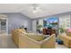 Bright living room boasts a large TV, comfortable seating, and natural light, creating a relaxing ambiance at 39 Cannon Pl, Dallas, GA 30157