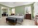 Airy main bedroom with wood flooring, a ceiling fan, and lots of natural light streaming through the window at 39 Cannon Pl, Dallas, GA 30157