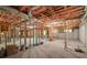 Unfinished basement with exposed insulation and ductwork, offering potential for customization and added living space at 7940 Gable Dr, Douglasville, GA 30135